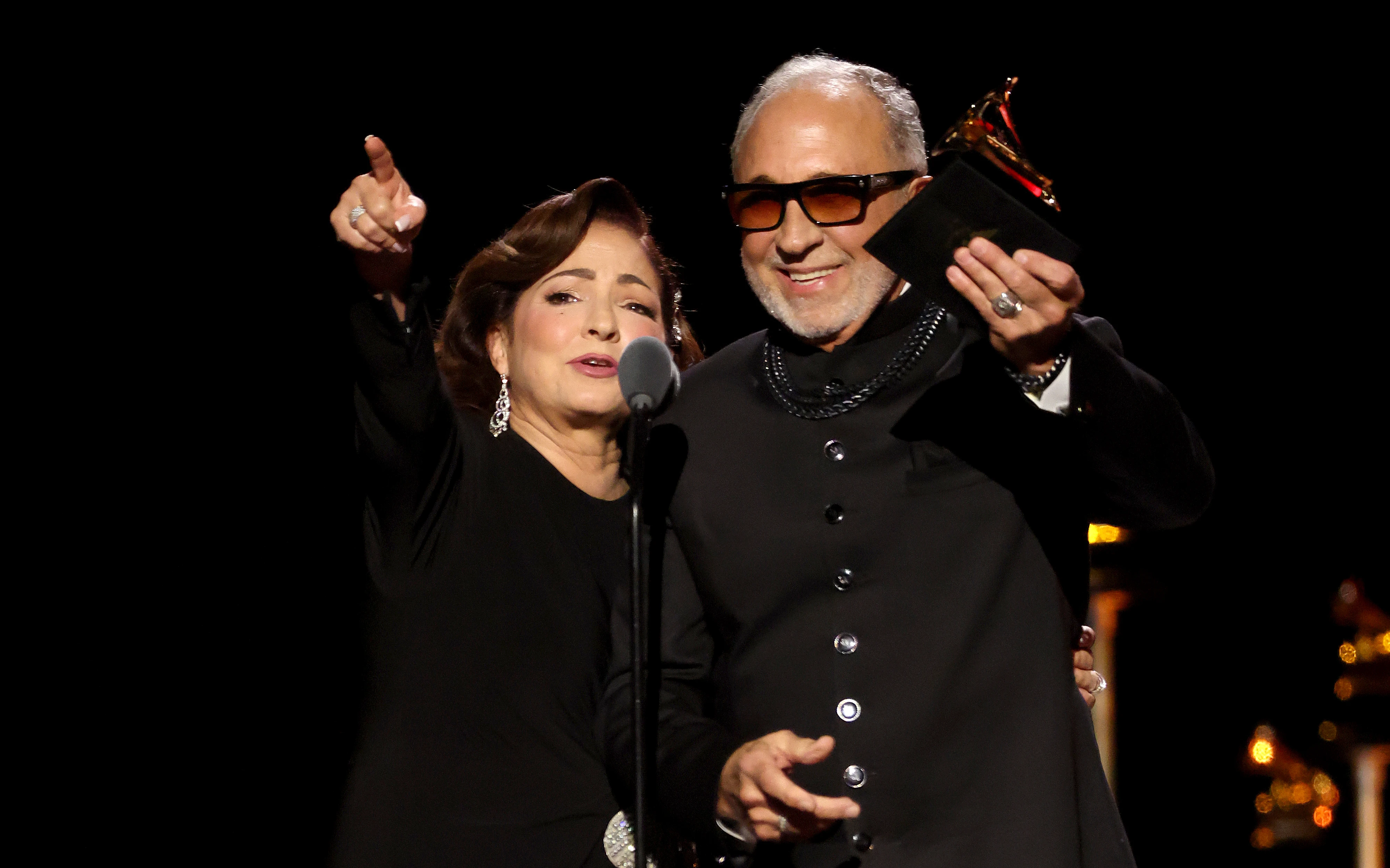 Gloria Estefan and Emilio Estefan accept the Best Tropical Latin Album award for "Raíces" onstage during the 68th GRAMMY Awards. Source: Getty Images