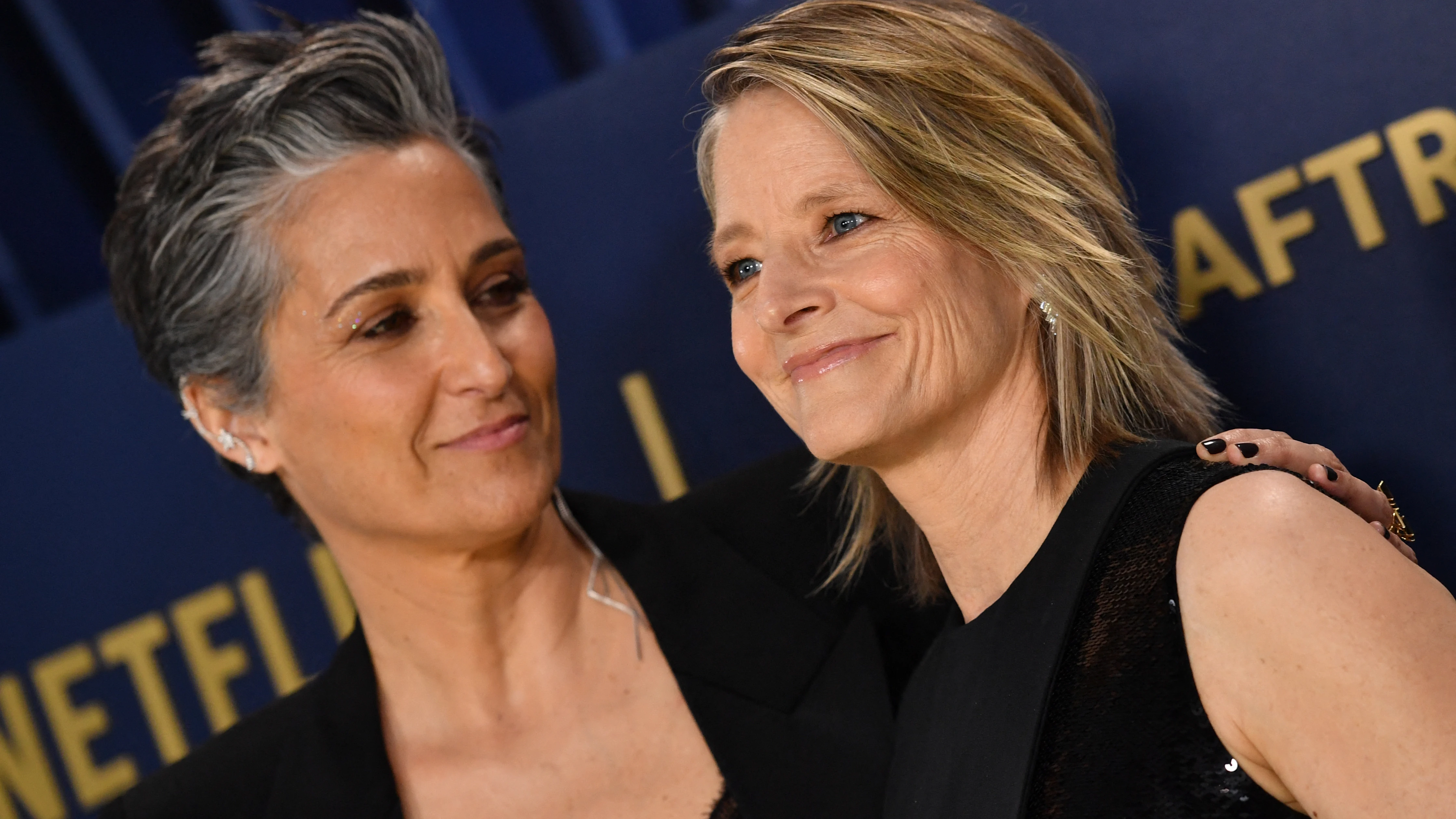 Jodie Foster and her wife director Alexandra Hedison arrive for the 30th Annual Screen Actors Guild awards. Source: Getty Images