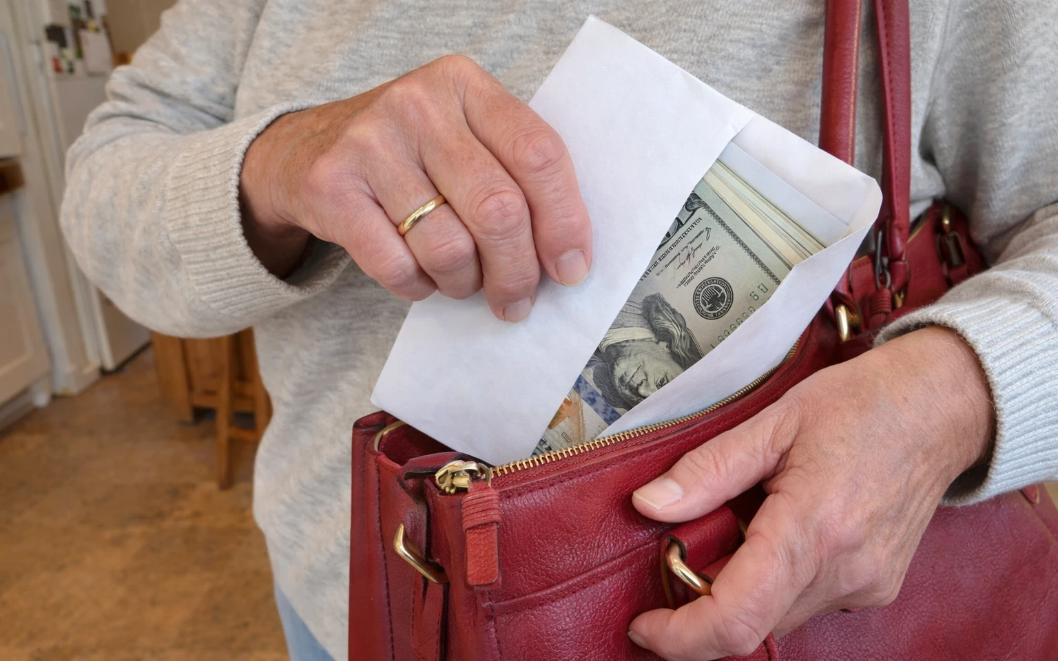 Hands with a handbag and a box of money | AI-generated image